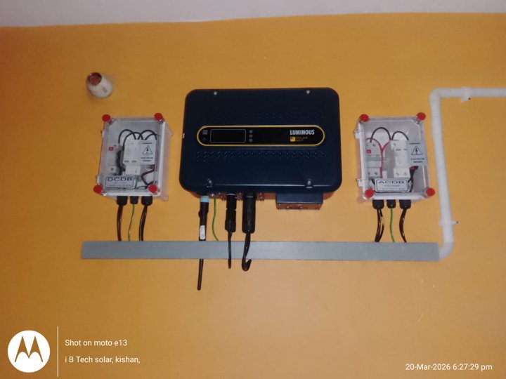 Luminous inverter mounted on yellow wall